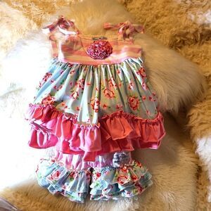 Sassy ruffles 2 piece outfit in excellent condition ,size9 months